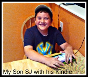 Son playing on his Kindle