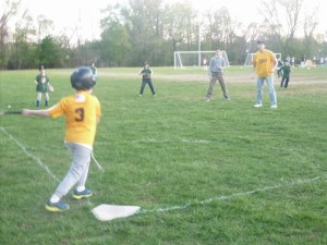 Coaches pitch in Little League