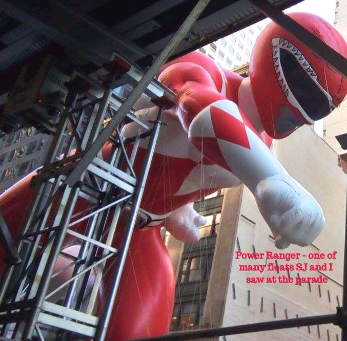 Power Ranger going down 6th Avenue at Macy's Thanksgiving Day Parade.